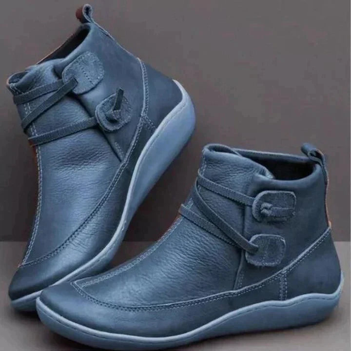Bottes noires femme en cuir avec design à boucle, mi-hautes 1