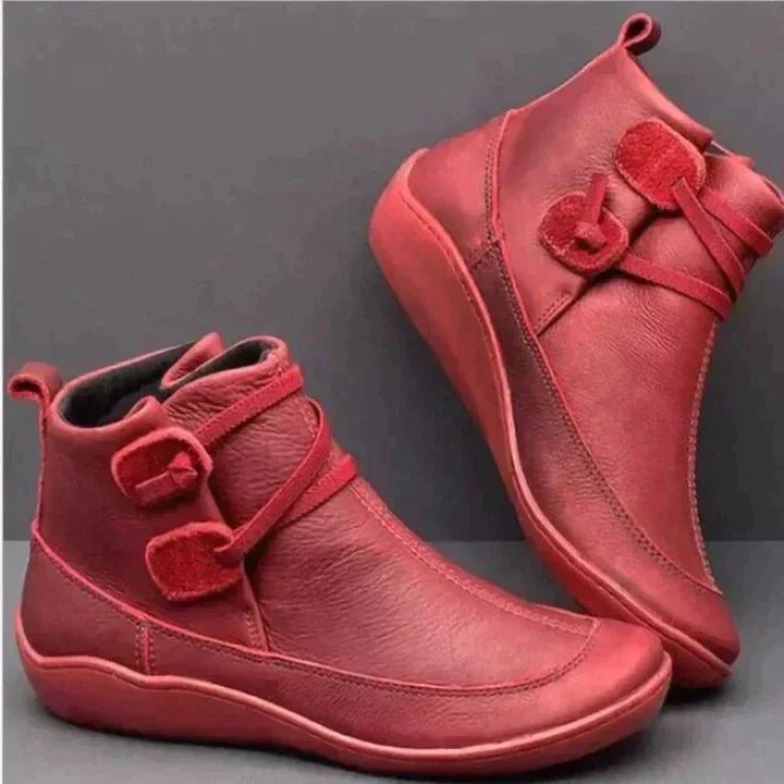 Bottes noires femme en cuir avec design à boucle, mi-hautes 2
