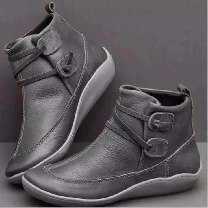 Bottes noires femme en cuir avec design à boucle, mi-hautes 3